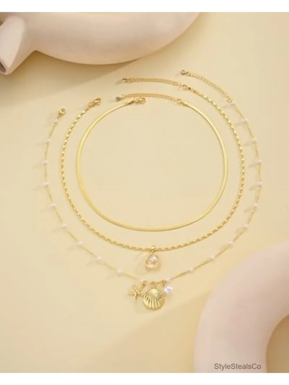 Layered Gold Plated Seashell Necklace Set with Starfish and Flower Pendants